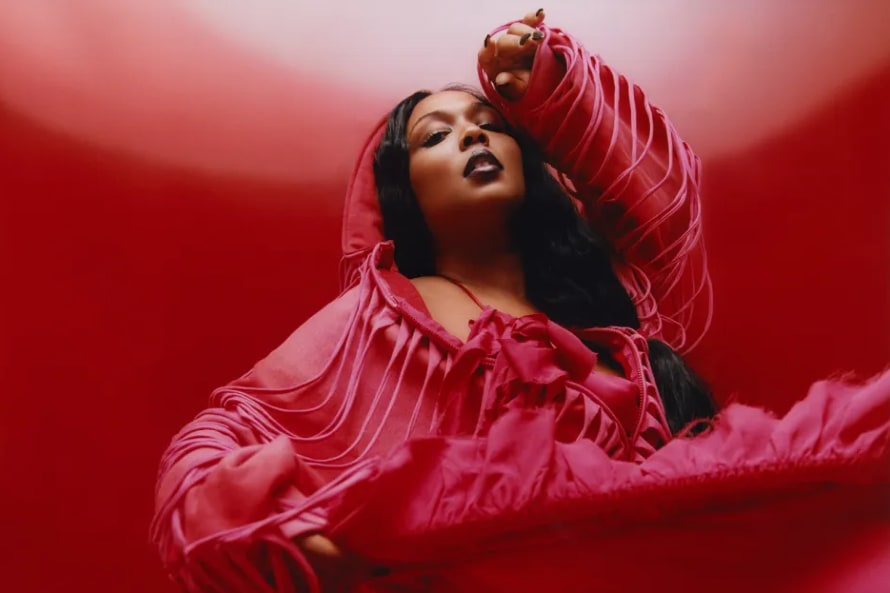Lizzo posing theatrically