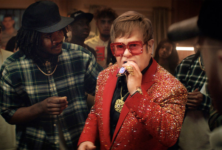 Watch Elton John Throw Down in Rap Battle │ Exclaim!