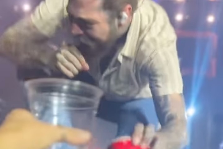 Watch Post Malone Fall Off the Stage Trying to Cheers a Fan